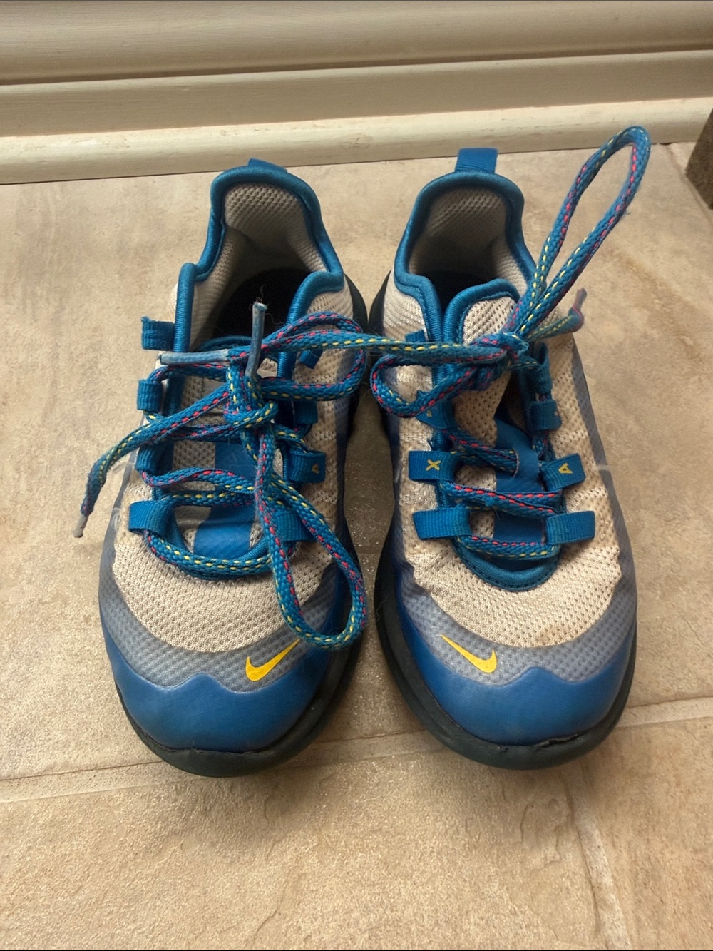 Nike Kids Blue and Gray Sneakers with Yellow Swoosh